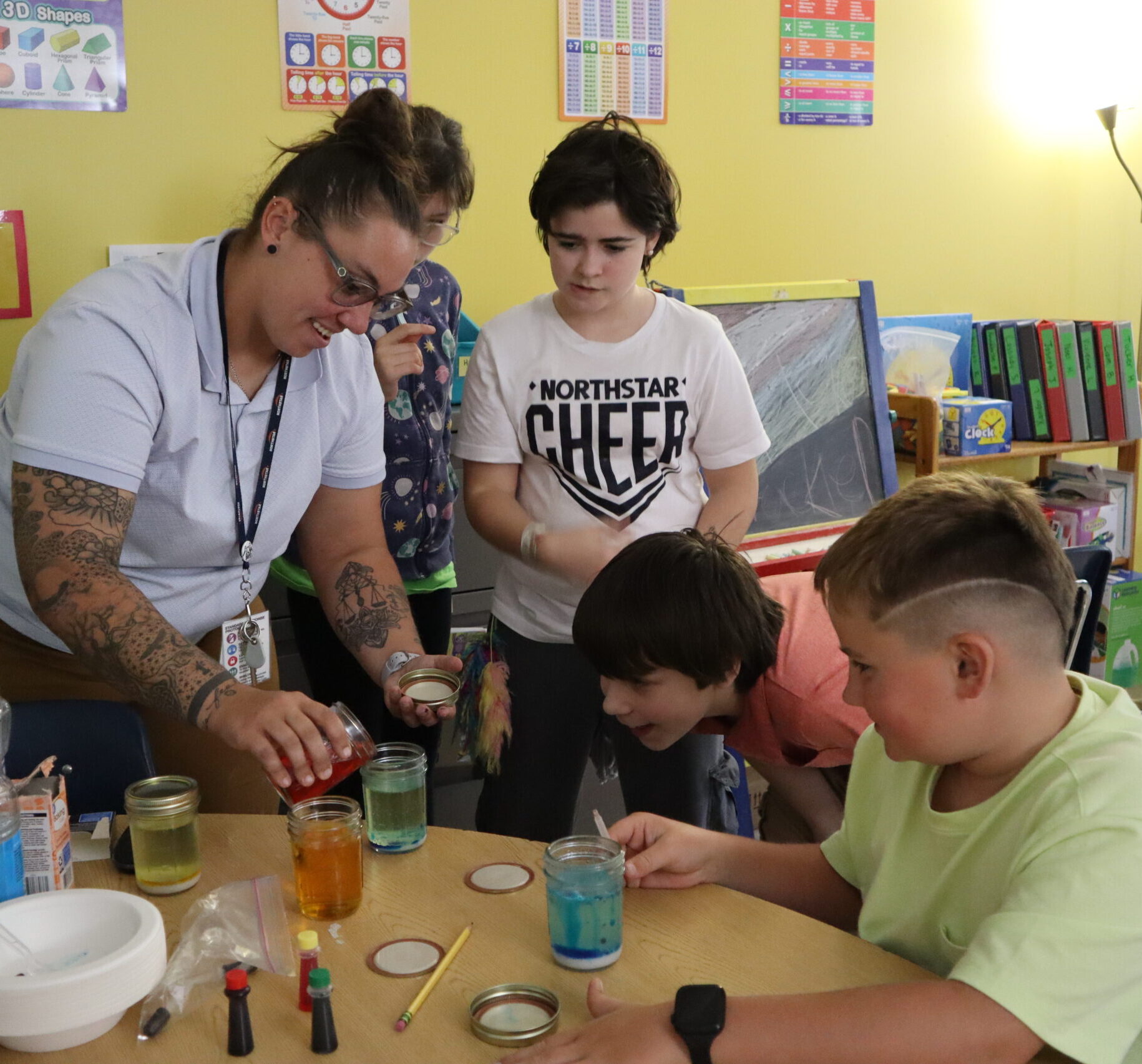 Lower School students making lava lamps