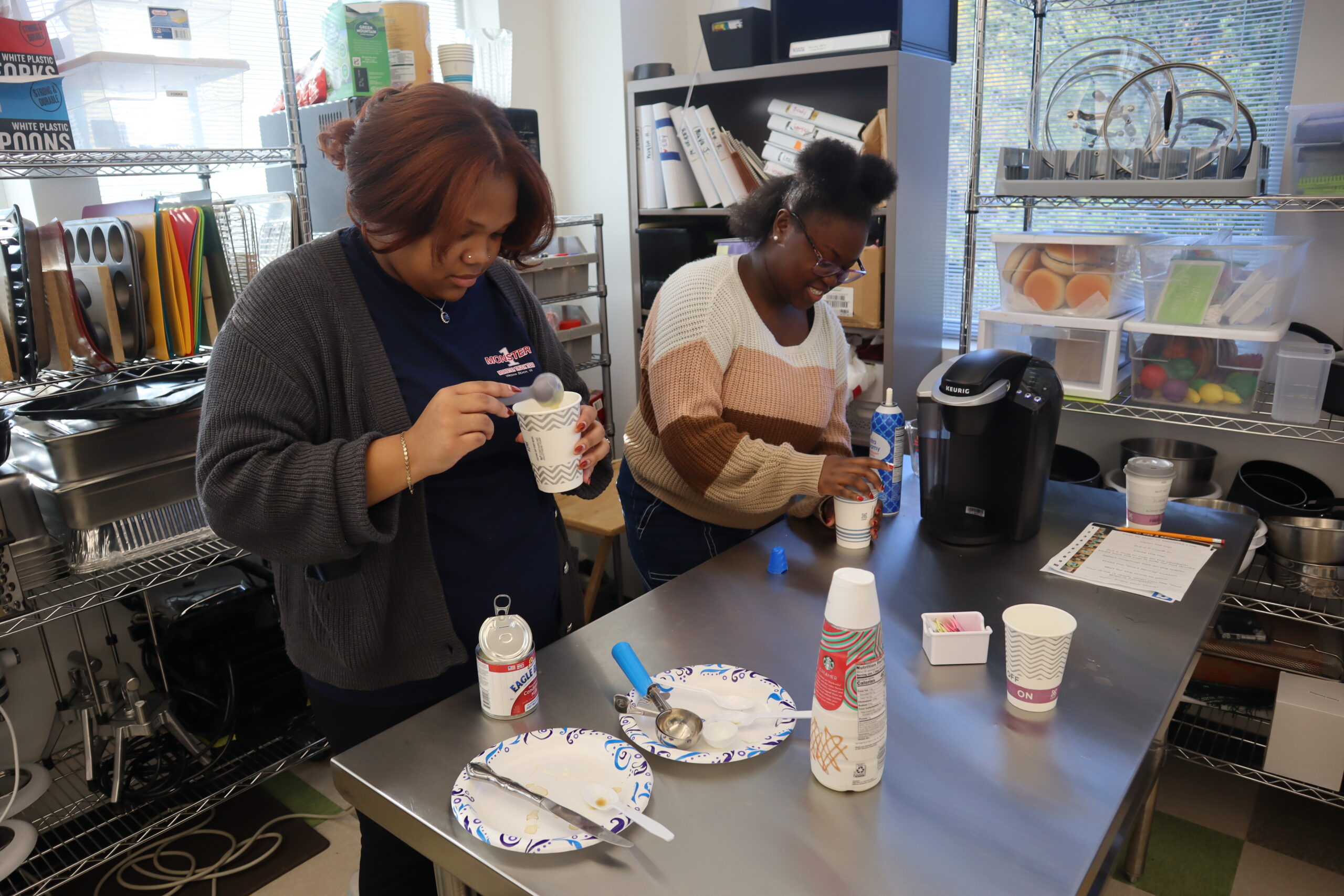 Hospitality students make hot chocolate, coffee, and tea.