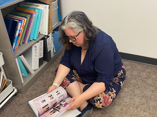 Wanda Ramsey with yearbooks Wanda Ramsey shares Northstar’s history while flipping through yearbooks.